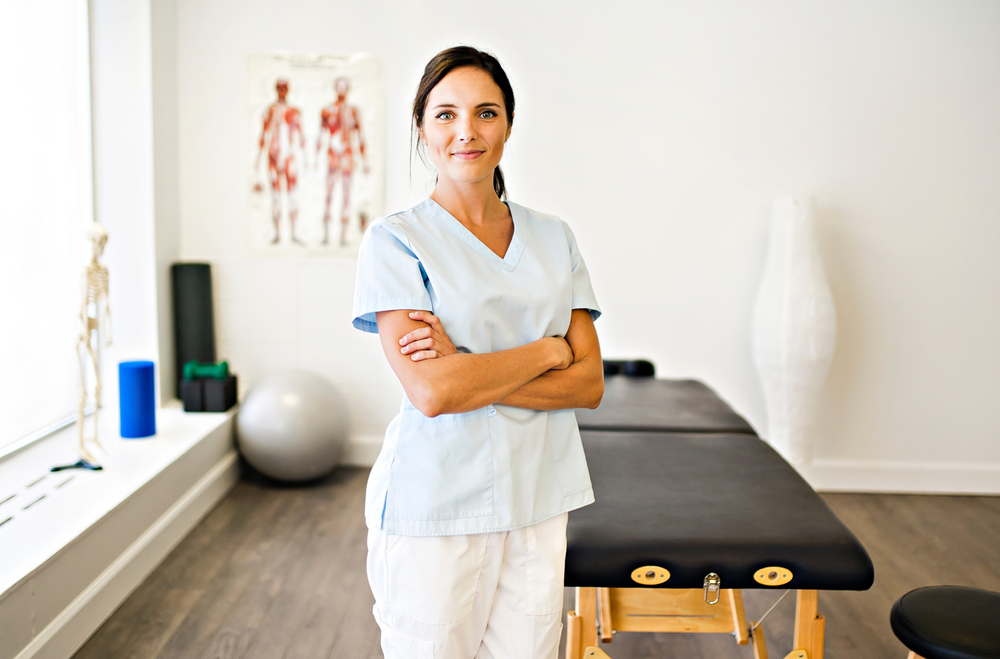 A Portrait of a physiotherapy woman smiling in uniform